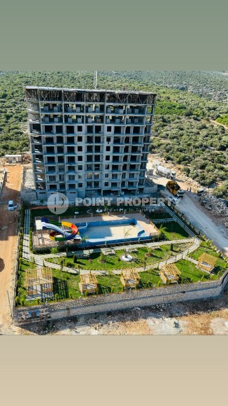 Апартаменты в жилом комплексе на этапе строительства, в популярном курортном и коммерческом районе Мерсина - Аяш-id-6517-фото-13