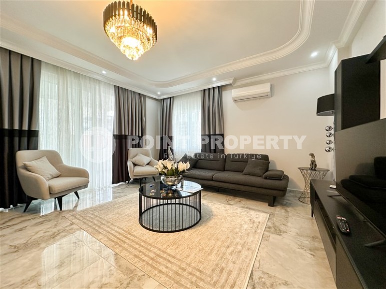 Spacious 1+1 apartment, on an area of 90 m2, in the center of a popular, developed area of Alanya - Mahmutlar-id-6524-photo-2