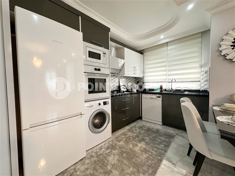 Spacious 1+1 apartment, on an area of 90 m2, in the center of a popular, developed area of Alanya - Mahmutlar-id-6524-photo-7