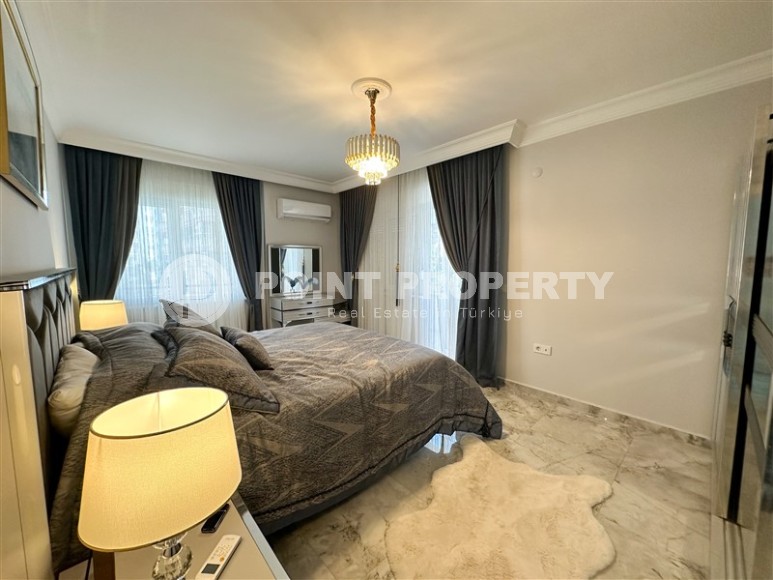 Spacious 1+1 apartment, on an area of 90 m2, in the center of a popular, developed area of Alanya - Mahmutlar-id-6524-photo-9