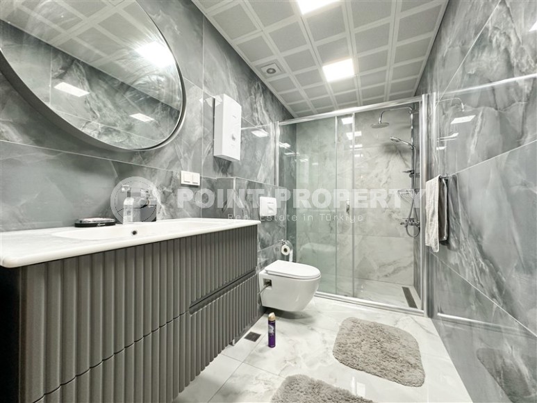 Spacious 1+1 apartment, on an area of 90 m2, in the center of a popular, developed area of Alanya - Mahmutlar-id-6524-photo-13