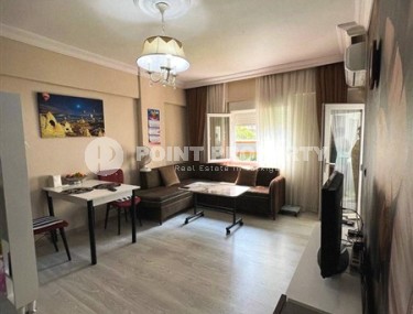 Small, ready-to-move-in 1+1 apartment 250 meters from the sea, in the center of Mahmutlar-id-6535-photo-1