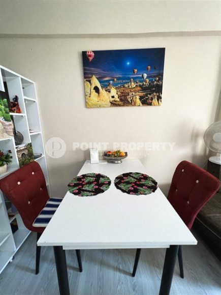 Small, ready-to-move-in 1+1 apartment 250 meters from the sea, in the center of Mahmutlar-id-6535-photo-4