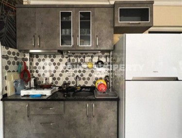 Small, ready-to-move-in 1+1 apartment 250 meters from the sea, in the center of Mahmutlar-id-6535-photo-5