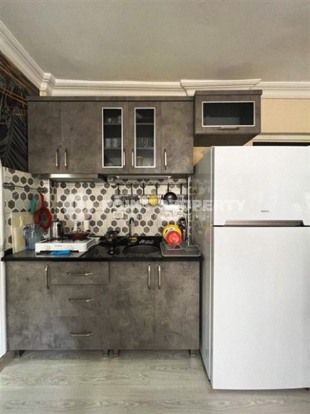 Small, ready-to-move-in 1+1 apartment 250 meters from the sea, in the center of Mahmutlar-id-6535-photo-5