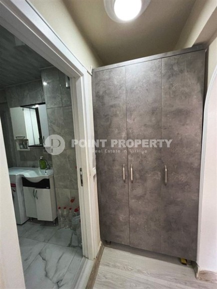 Small, ready-to-move-in 1+1 apartment 250 meters from the sea, in the center of Mahmutlar-id-6535-photo-8