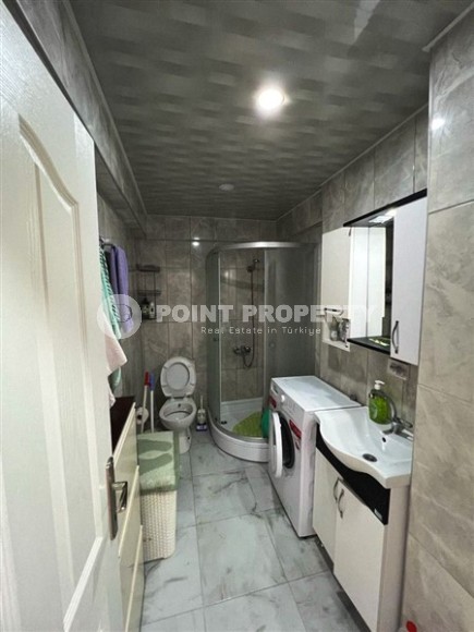 Small, ready-to-move-in 1+1 apartment 250 meters from the sea, in the center of Mahmutlar-id-6535-photo-9