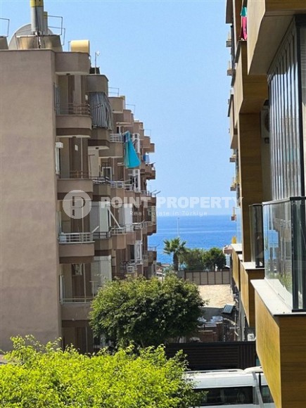 Small, ready-to-move-in 1+1 apartment 250 meters from the sea, in the center of Mahmutlar-id-6535-photo-14