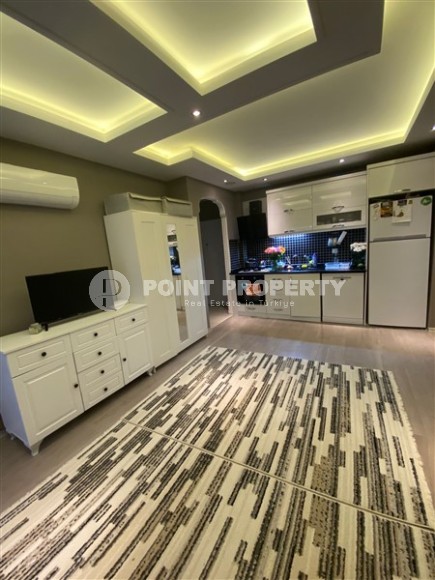 Небольшая квартира 1+1, на 1-м этаже в 500 метрах от моря, в центре спокойного района Аланьи - Авсаллар-id-6536-фото-2