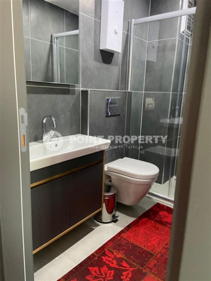 Двухкомнатная квартира, 50м², в доме городского типа в 500м от моря в районе Газипаша, Алания-id-1514-фото-5