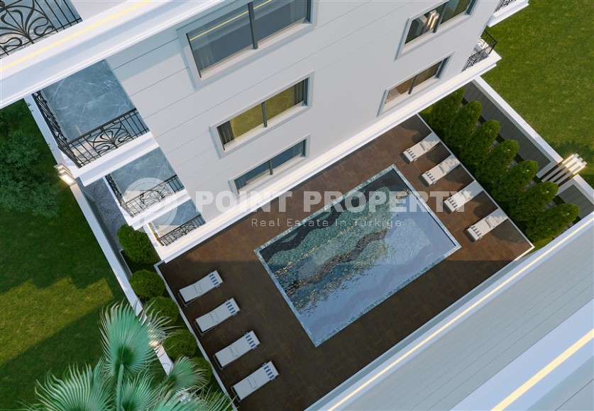 Квартиры в строящемся жилом комплексе, в 200 метрах от моря, в центре района Махмутлар-id-6545-фото-4