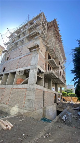 Квартиры в строящемся жилом комплексе, в 200 метрах от моря, в центре района Махмутлар-id-6545-фото-5