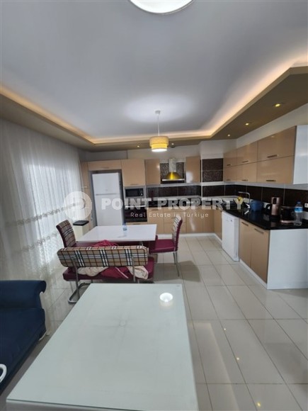 Благоустроенная квартира с мебелью и бытовой техникой, в 350 метрах от моря, в центре курортного района Мерсина - Арпачбахшиш-id-6552-фото-3