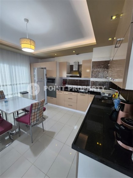 Благоустроенная квартира с мебелью и бытовой техникой, в 350 метрах от моря, в центре курортного района Мерсина - Арпачбахшиш-id-6552-фото-4