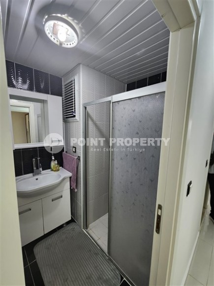 Благоустроенная квартира с мебелью и бытовой техникой, в 350 метрах от моря, в центре курортного района Мерсина - Арпачбахшиш-id-6552-фото-8