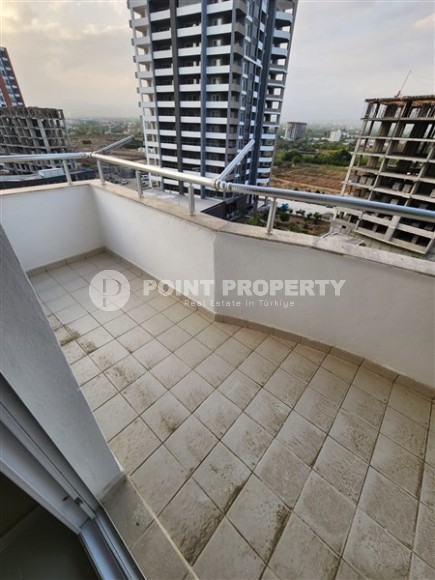 Благоустроенная квартира с мебелью и бытовой техникой, в 350 метрах от моря, в центре курортного района Мерсина - Арпачбахшиш-id-6552-фото-11