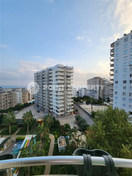 Благоустроенная квартира с мебелью и бытовой техникой, в 350 метрах от моря, в центре курортного района Мерсина - Арпачбахшиш-id-6552-фото-12