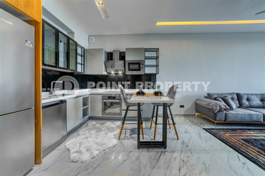 Современная квартира в роскошном жилом комплексе на первой линии от  моря, в центре живописного, экологически чистого районе Аланьи - Каргыджак-id-6561-фото-7