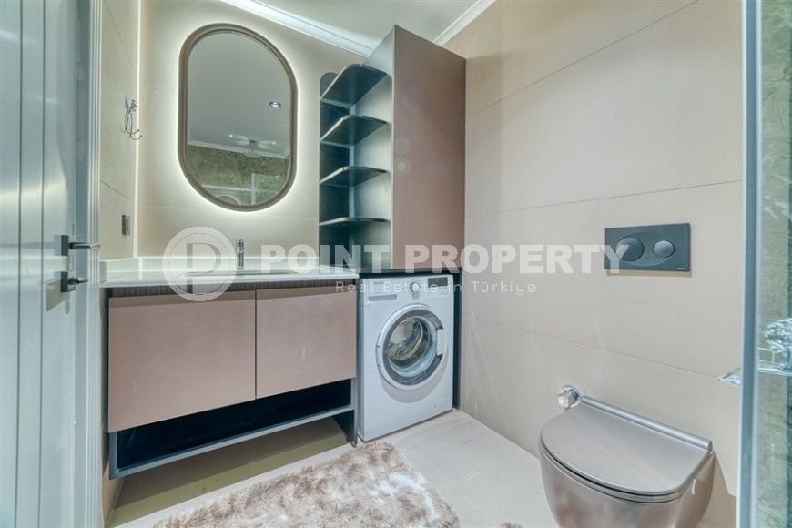 Современная квартира в роскошном жилом комплексе на первой линии от  моря, в центре живописного, экологически чистого районе Аланьи - Каргыджак-id-6561-фото-12