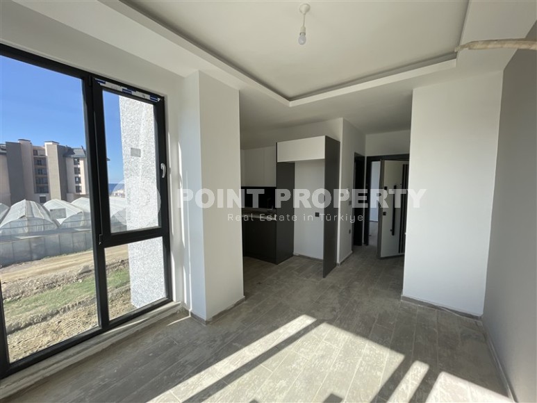 Двухкомнатная квартира, 50м², в комплексе на этапе строительства в 217м от моря, Аланья, Каргыджак-id-2167-фото-2