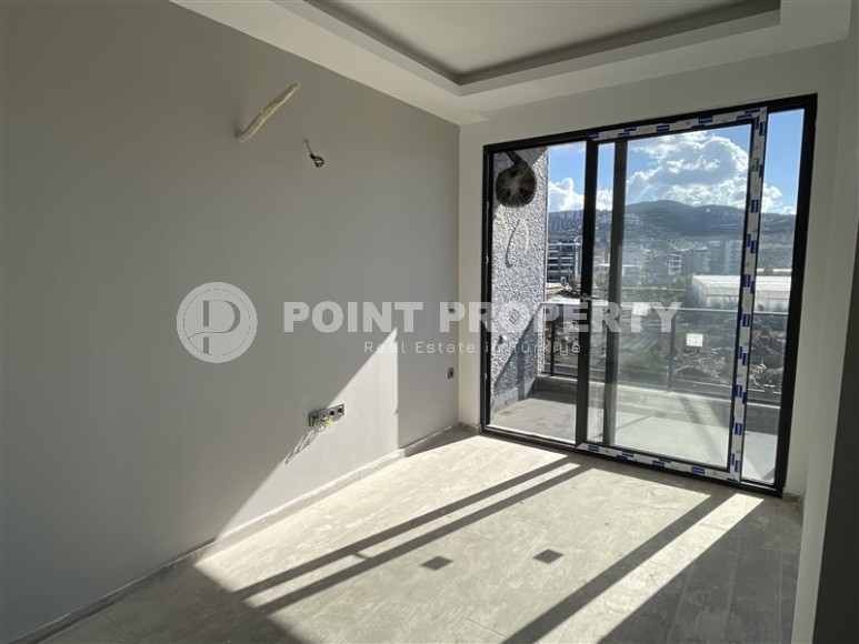 Двухкомнатная квартира, 50м², в комплексе на этапе строительства в 217м от моря, Аланья, Каргыджак-id-2167-фото-3