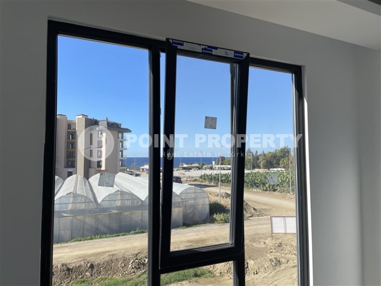 Двухкомнатная квартира, 50м², в комплексе на этапе строительства в 217м от моря, Аланья, Каргыджак-id-2167-фото-5