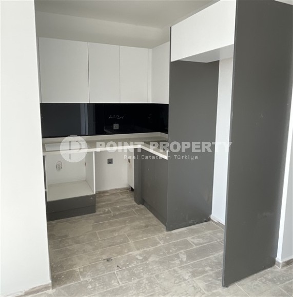 Двухкомнатная квартира, 50м², в комплексе на этапе строительства в 217м от моря, Аланья, Каргыджак-id-2167-фото-6