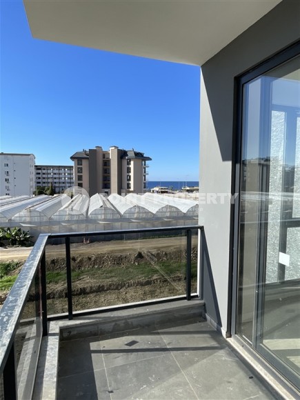 Двухкомнатная квартира, 50м², в комплексе на этапе строительства в 217м от моря, Аланья, Каргыджак-id-2167-фото-8