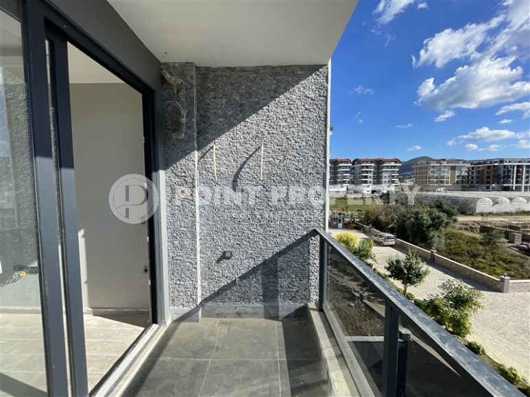 Двухкомнатная квартира, 50м², в комплексе на этапе строительства в 217м от моря, Аланья, Каргыджак-id-2167-фото-9