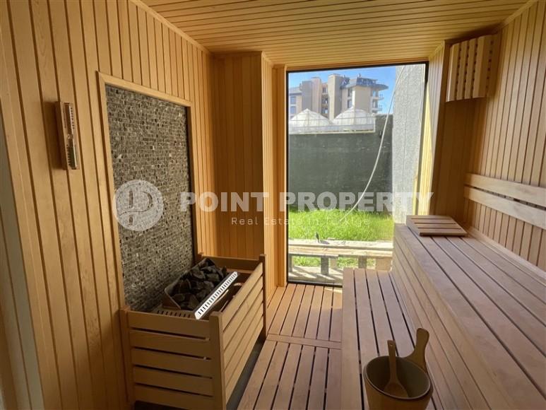 Двухкомнатная квартира, 50м², в комплексе на этапе строительства в 217м от моря, Аланья, Каргыджак-id-2167-фото-10