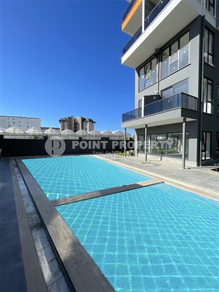 Двухкомнатная квартира, 50м², в комплексе на этапе строительства в 217м от моря, Аланья, Каргыджак-id-2167-фото-13