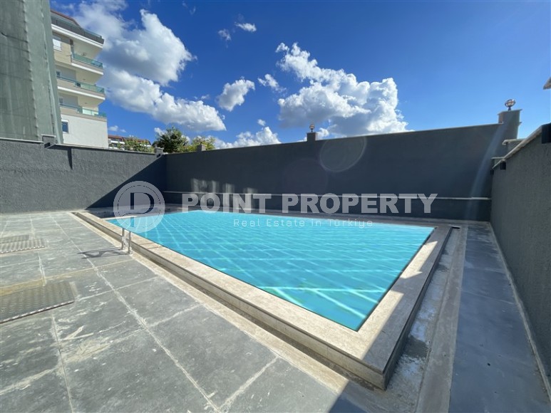 Двухкомнатная квартира, 50м², в комплексе на этапе строительства в 217м от моря, Аланья, Каргыджак-id-2167-фото-14