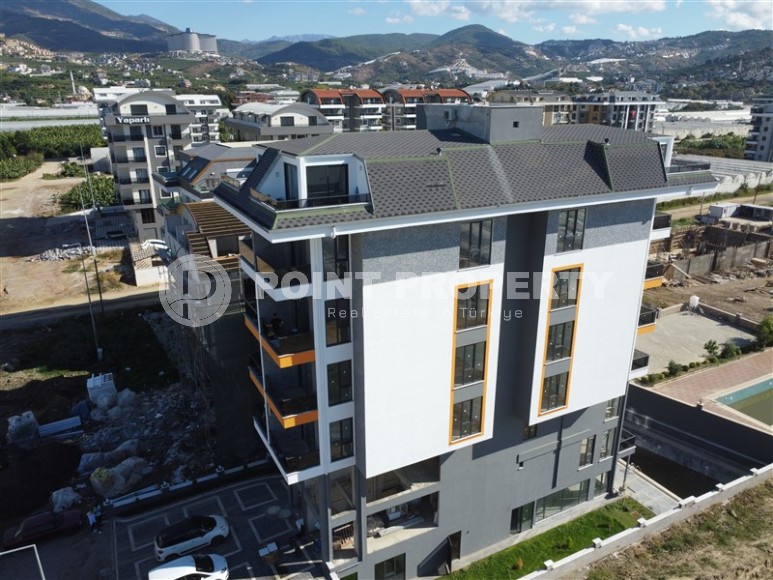 Двухкомнатная квартира, 50м², в комплексе на этапе строительства в 217м от моря, Аланья, Каргыджак-id-2167-фото-15