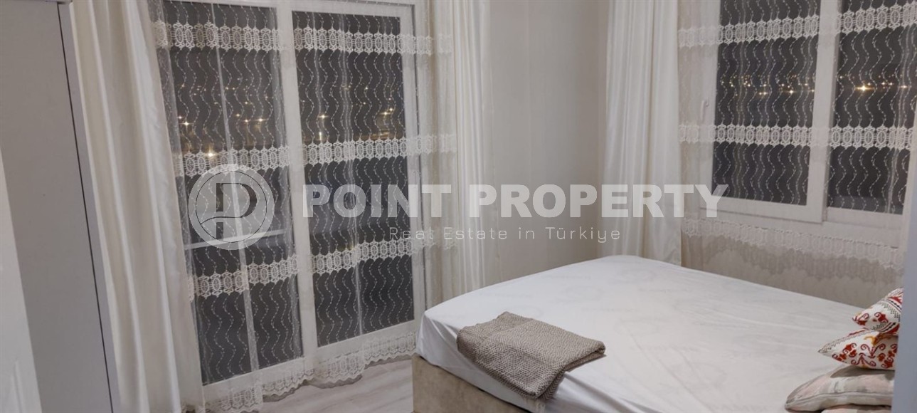 Небольшая меблированная квартира на 8-м этаже, в центре курортного района Мерсина - Эрдемли-id-6564-фото-3