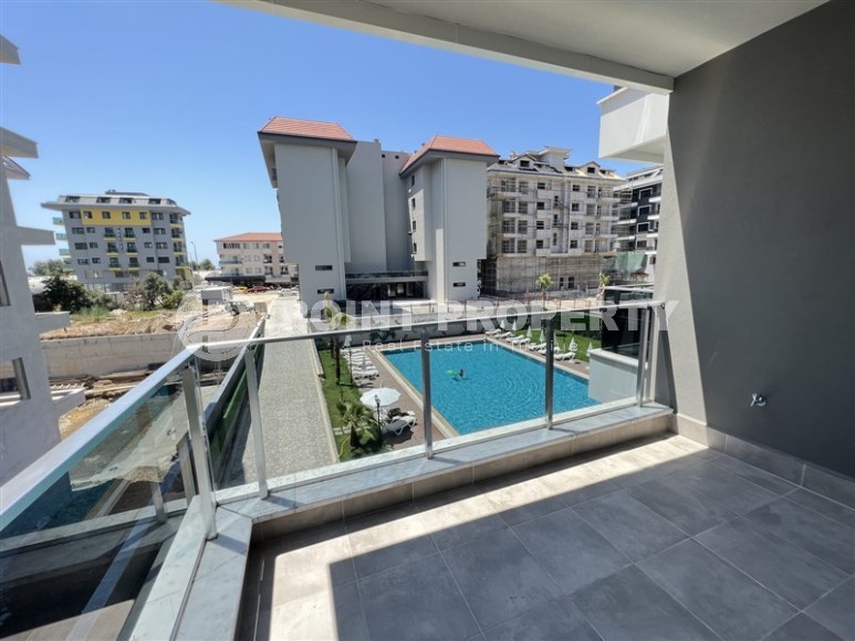 Компактная новая квартира с чистовой отделкой, на 3-м этаже в современном жилом комплексе, в 100 метрах от моря-id-6567-фото-8