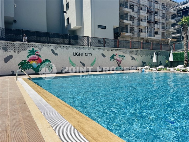 Компактная новая квартира с чистовой отделкой, на 3-м этаже в современном жилом комплексе, в 100 метрах от моря-id-6567-фото-15