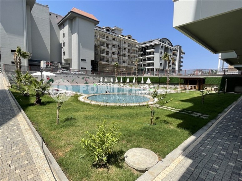 Компактная новая квартира с чистовой отделкой, на 3-м этаже в современном жилом комплексе, в 100 метрах от моря-id-6567-фото-16