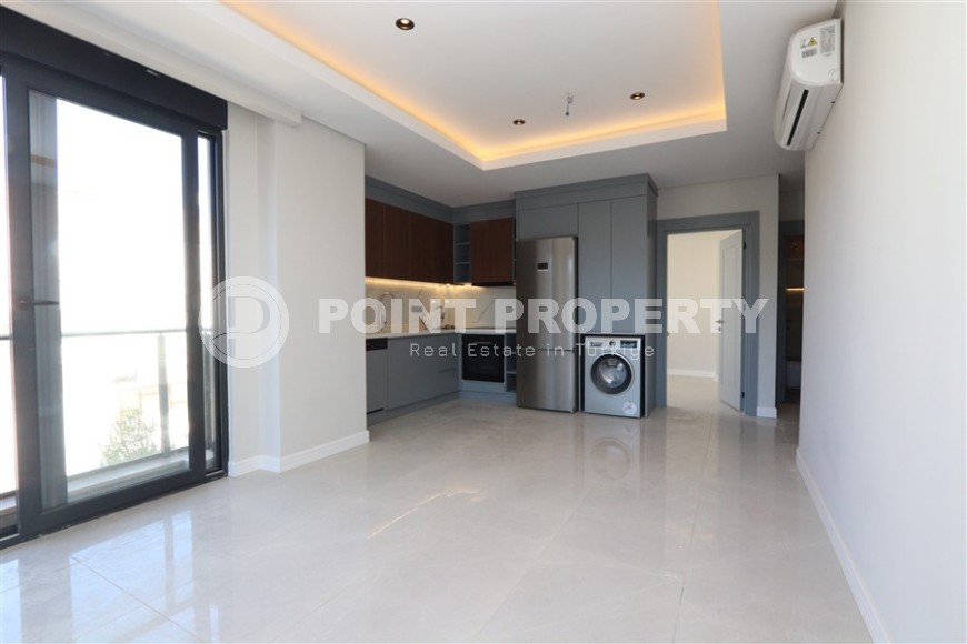 Квартира с высококачественной чистовой отделкой и новейшей бытовой техникой, в центре популярного района Аланьи - Нижняя Оба-id-6568-фото-3