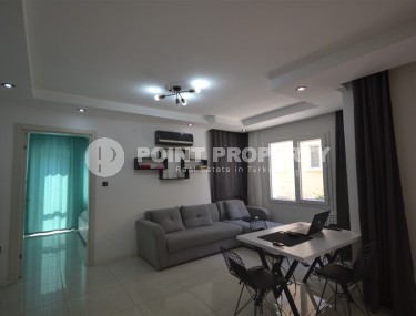 Well-maintained, furnished apartment 1+1, with a total area of 60 m2, in the center of a quiet area of Alanya - Tosmur-id-6569-photo-1