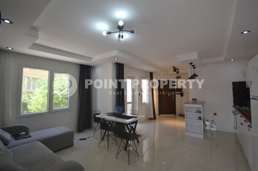 Благоустроенная, меблированная квартира 1+1, общей площадью 60 м2, в центре спокойного района Аланьи - Тосмур-id-6569-фото-2