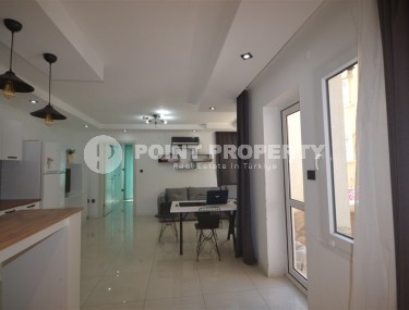 Благоустроенная, меблированная квартира 1+1, общей площадью 60 м2, в центре спокойного района Аланьи - Тосмур-id-6569-фото-3