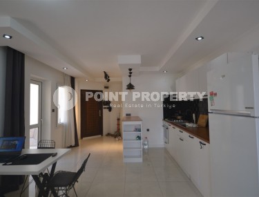 Благоустроенная, меблированная квартира 1+1, общей площадью 60 м2, в центре спокойного района Аланьи - Тосмур-id-6569-фото-4