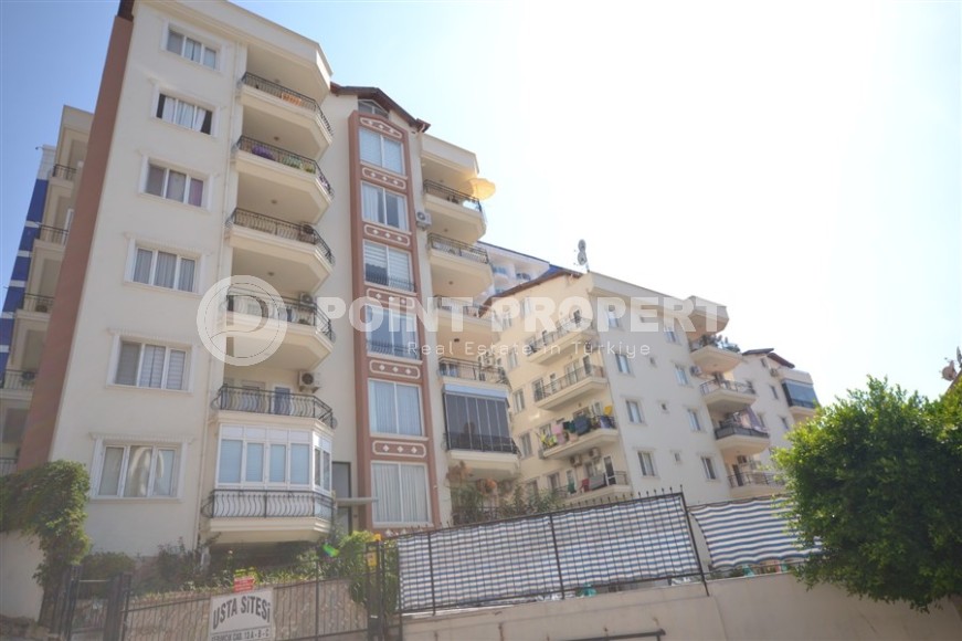 Благоустроенная, меблированная квартира 1+1, общей площадью 60 м2, в центре спокойного района Аланьи - Тосмур-id-6569-фото-17