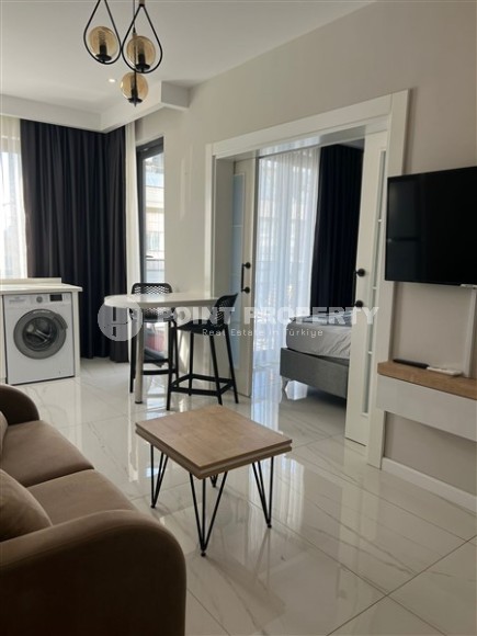 Compact, modern 1+1 apartment, on the 4th floor in a residential complex built in 2020-id-6577-photo-2