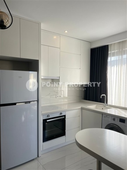 Compact, modern 1+1 apartment, on the 4th floor in a residential complex built in 2020-id-6577-photo-3