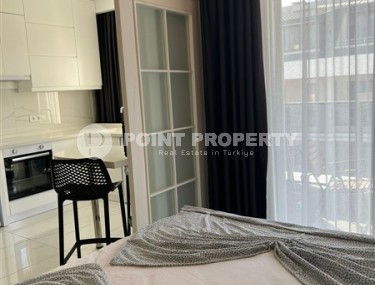 Compact, modern 1+1 apartment, on the 4th floor in a residential complex built in 2020-id-6577-photo-5