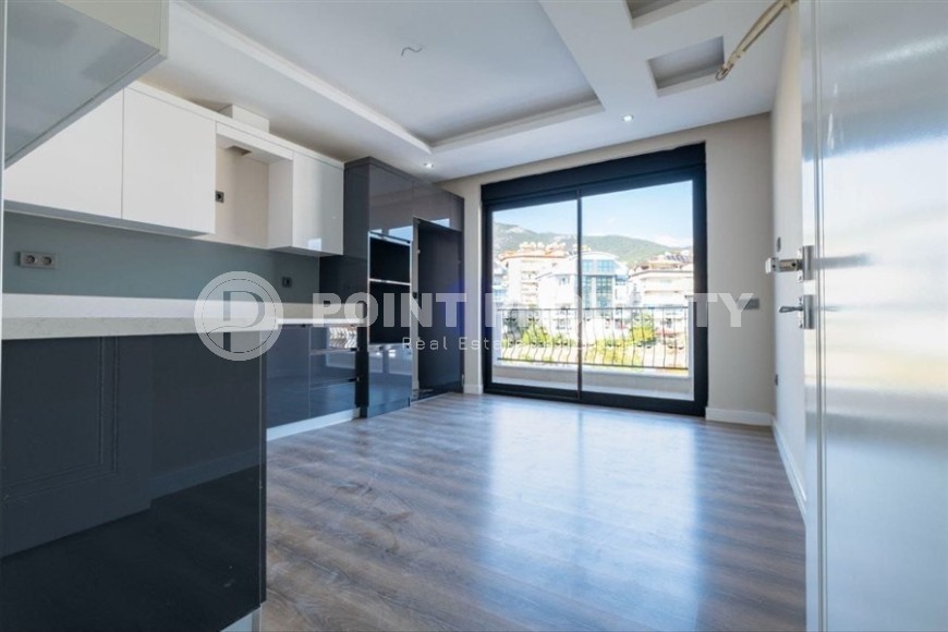 Новая квартира с качественной чистовой отделкой, в жилом комплексе премиум класса, в центре Аланьи-id-6599-фото-2