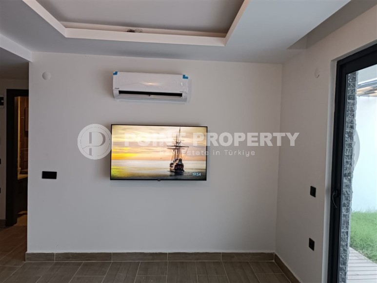 Небольшая новая квартира с собственным садом, в современном районе Аланьи - Махмутлар-id-6604-фото-3