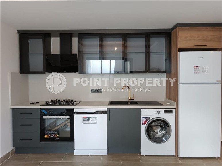 Небольшая новая квартира с собственным садом, в современном районе Аланьи - Махмутлар-id-6604-фото-5