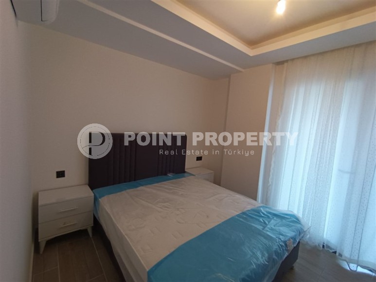 Небольшая новая квартира с собственным садом, в современном районе Аланьи - Махмутлар-id-6604-фото-6